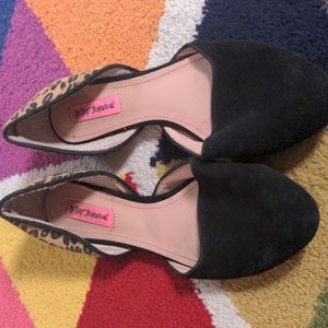 Women slip on shoes.